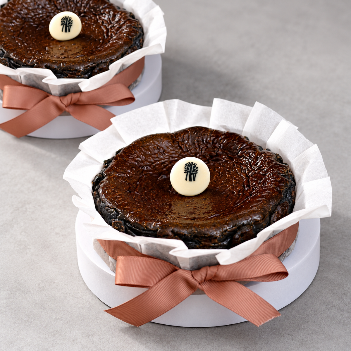 Black Sesame Burnt Cheesecake by Bake by Banyan Tree – styled cake arrangement