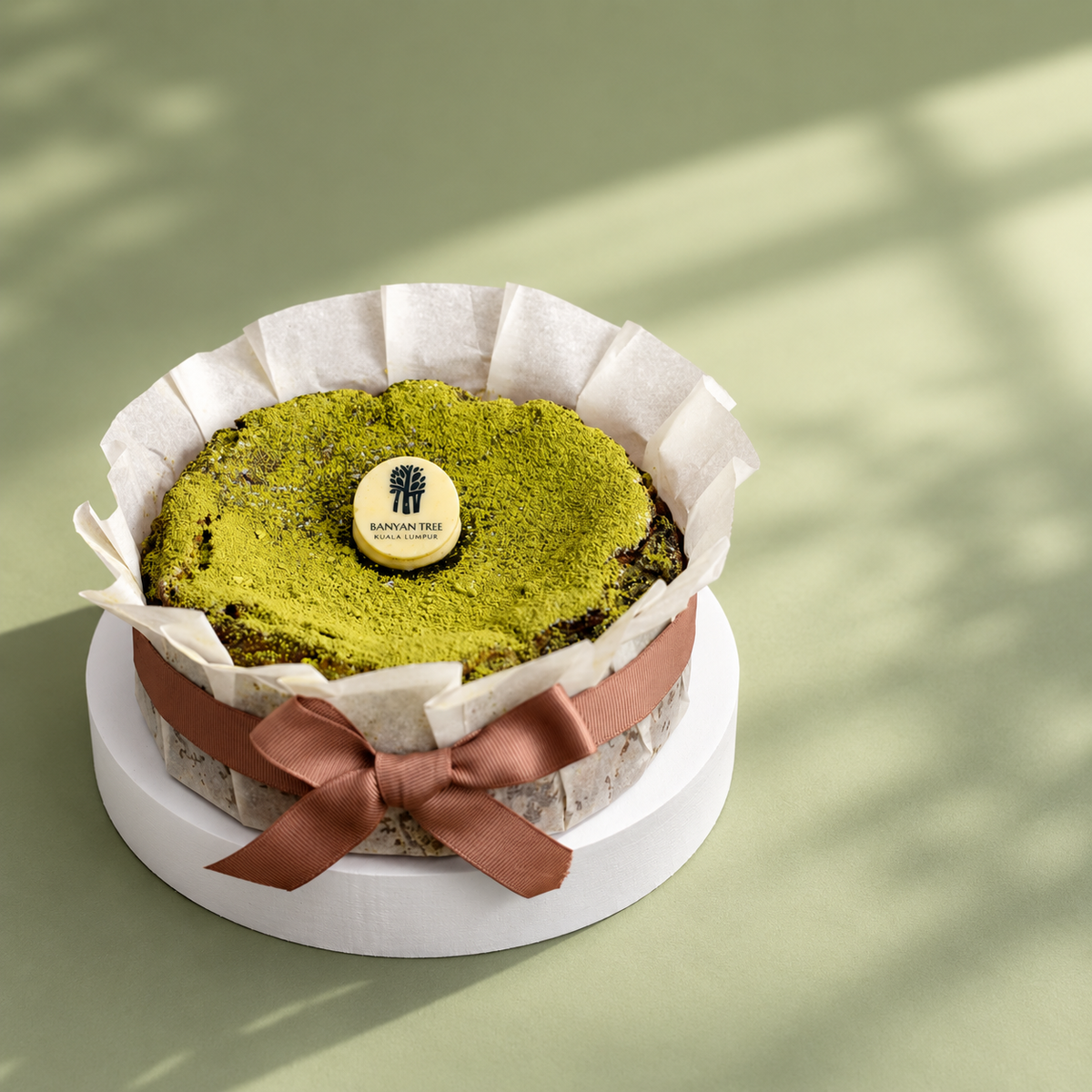 Matcha Burnt Cheesecake by Bake by Banyan Tree – styled cake arrangement